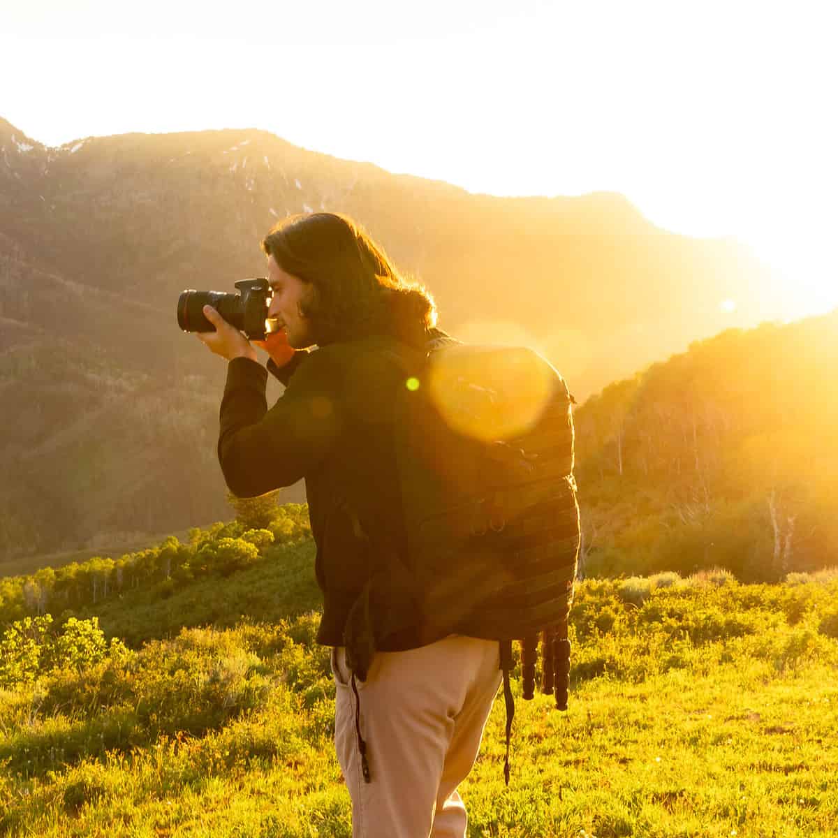 A Photographer shooting a sunset.
